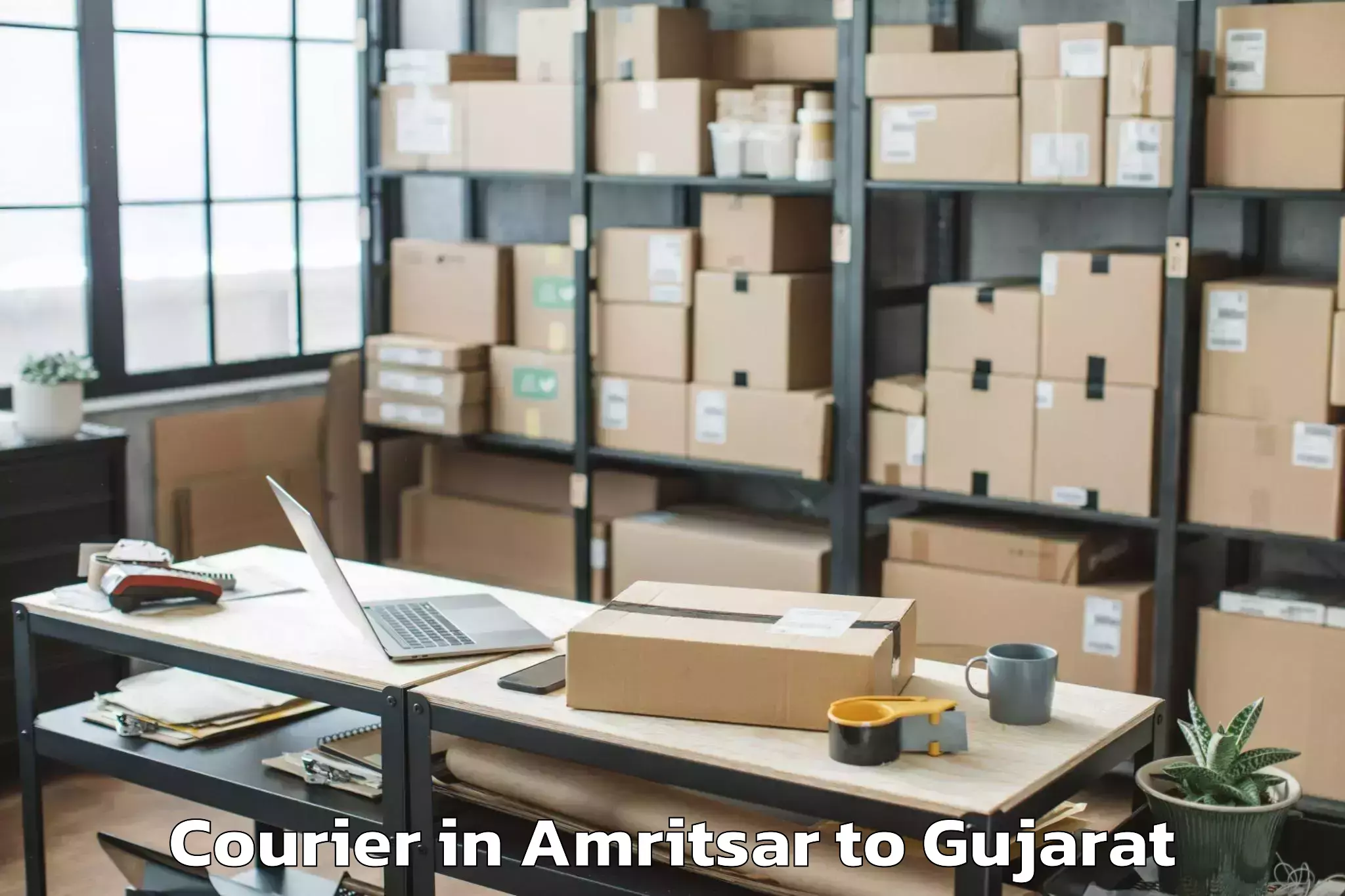 Affordable Amritsar to Garbada Courier